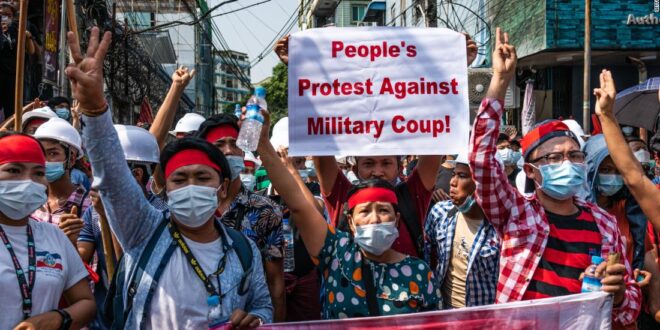 Burmese demonstrators give 'Hunger Games' salute at anti ...